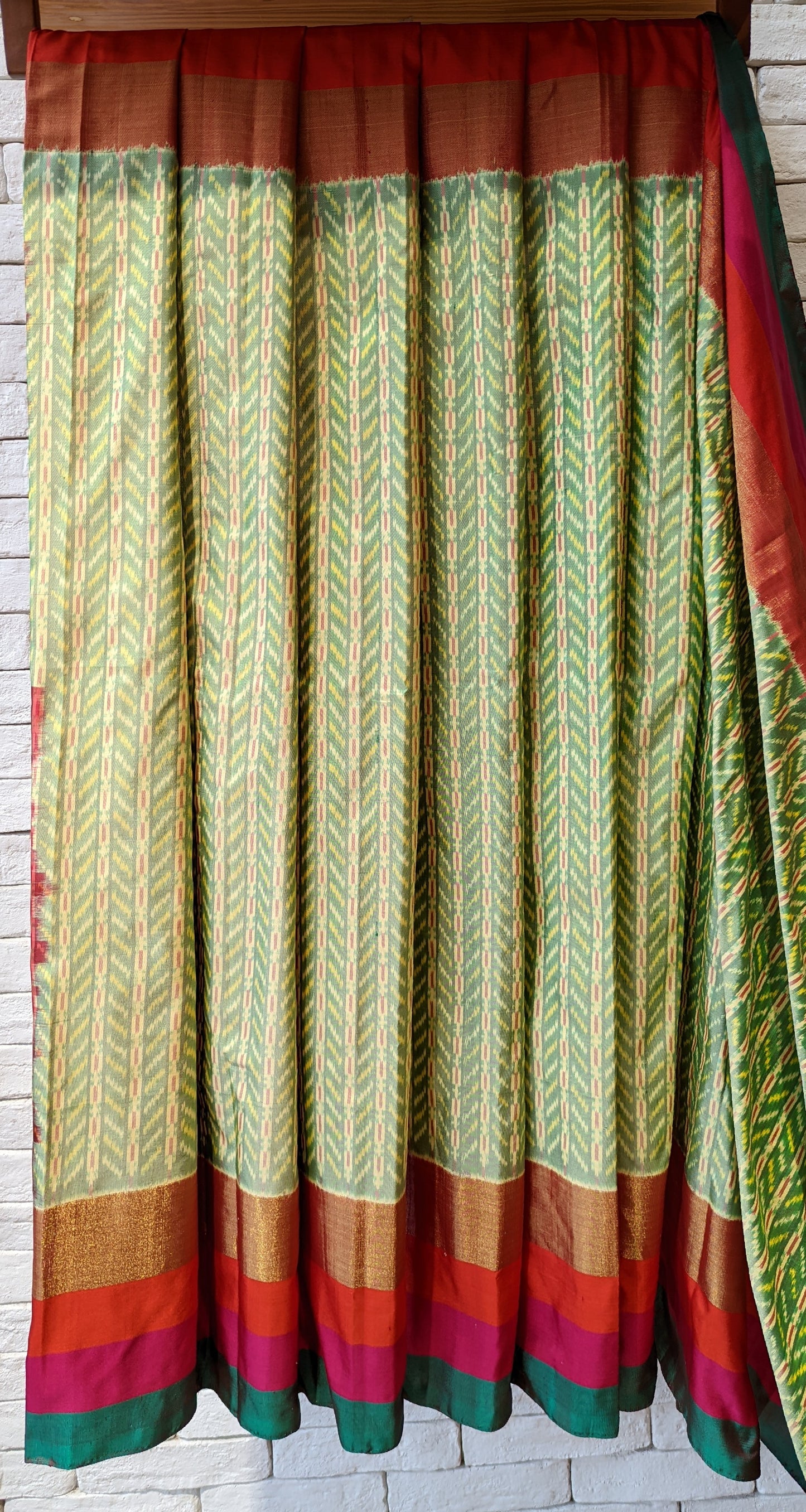 Handloom Pastel Green Pure silk Ikat saree